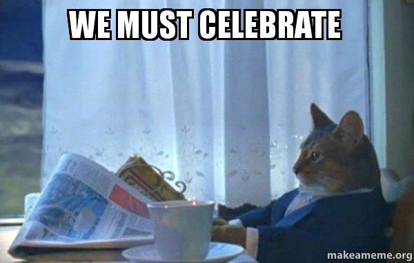 A cat celebrating.